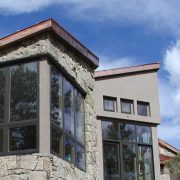dramatic-contrast-copper-stone-glass-stucco